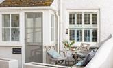 Start the day with an alfresco breakfast in the front courtyard. - Thumbnail Image