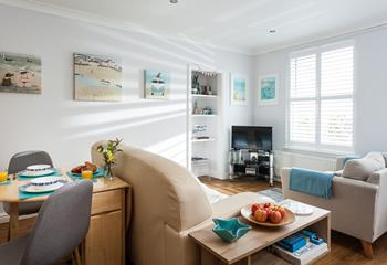 The open plan living area ensures the property feels bright and airy, ideal for unwinding in.