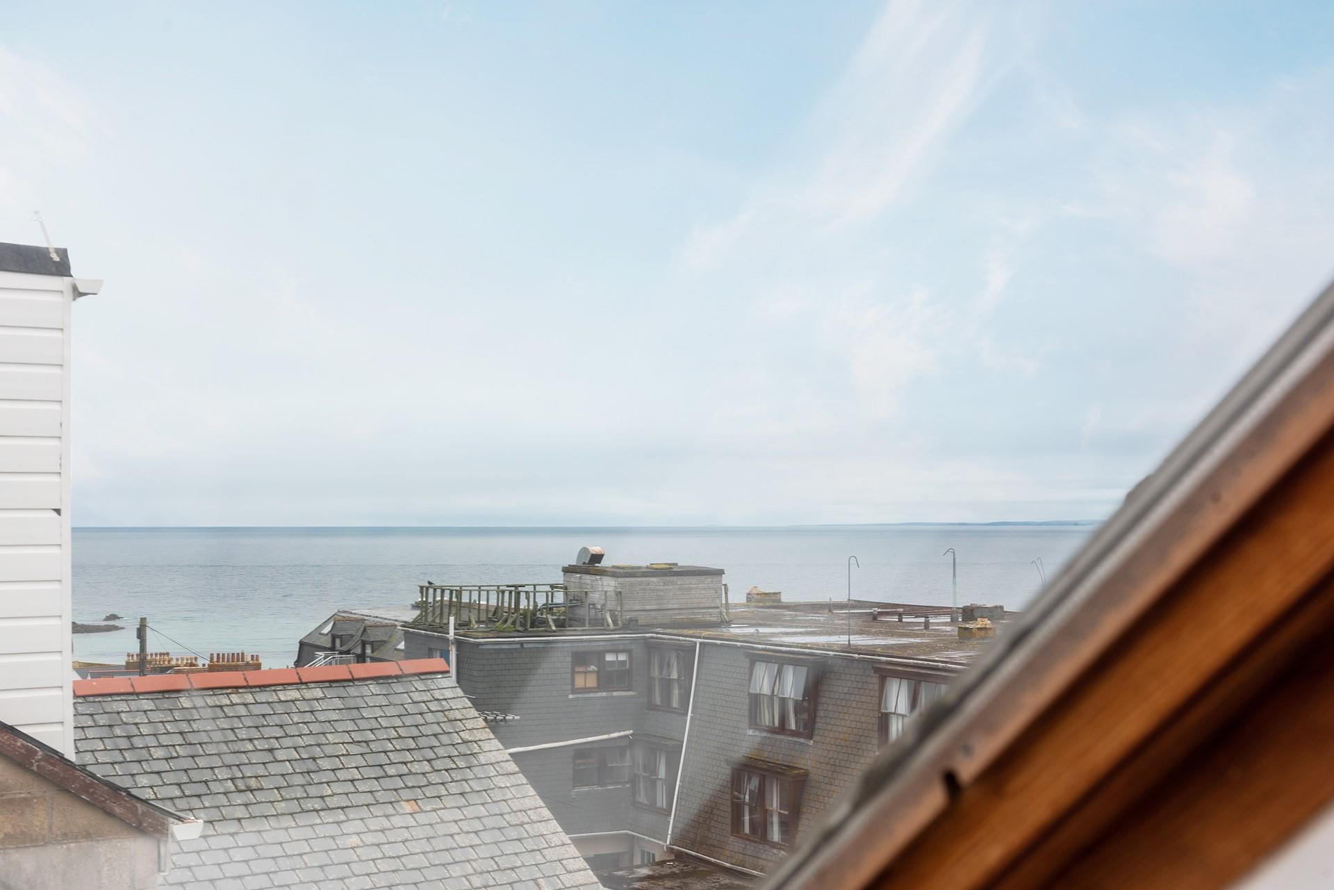 Gaze out at the rolling waves on a stormy winter's day.