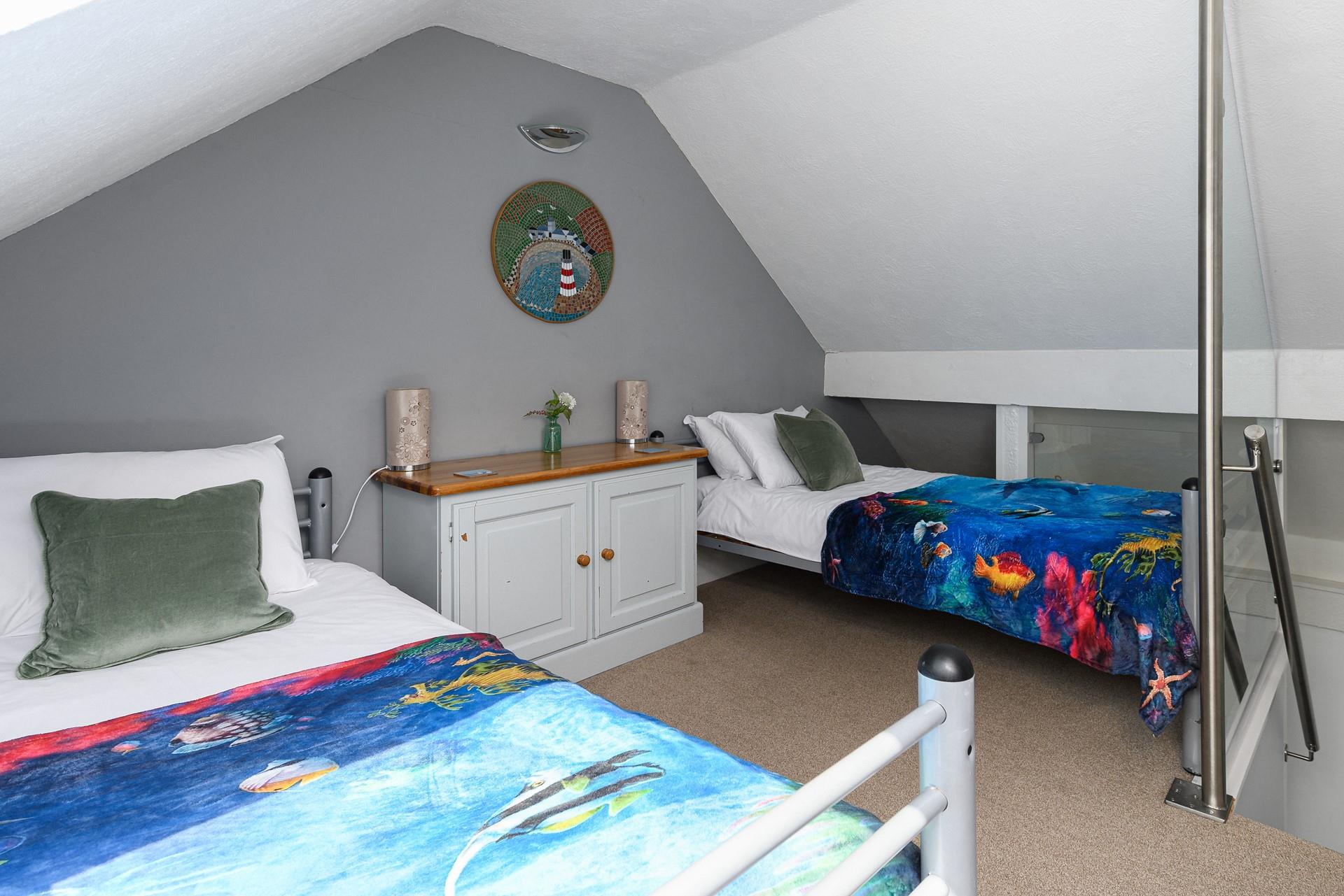 Bedroom 2 has twin beds, perfect for the little ones.