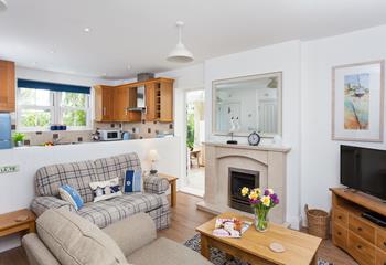 The cosy sitting room is a space to relax after a day exploring the South West Coast Path.