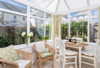 Enjoy breakfast in the conservatory before heading out to the beach.
