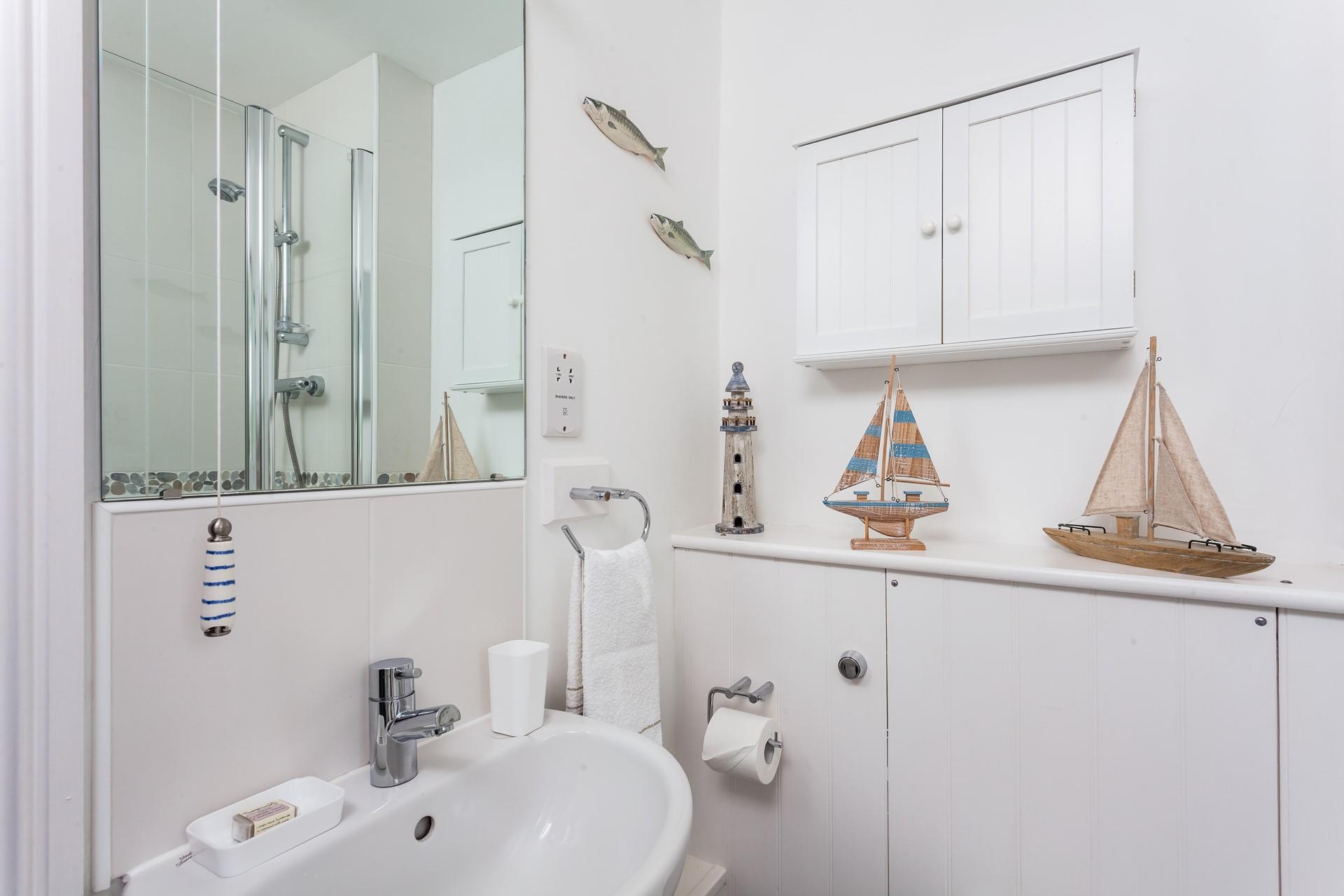 Get ready for a day at the beach in the seaside themed bathroom.