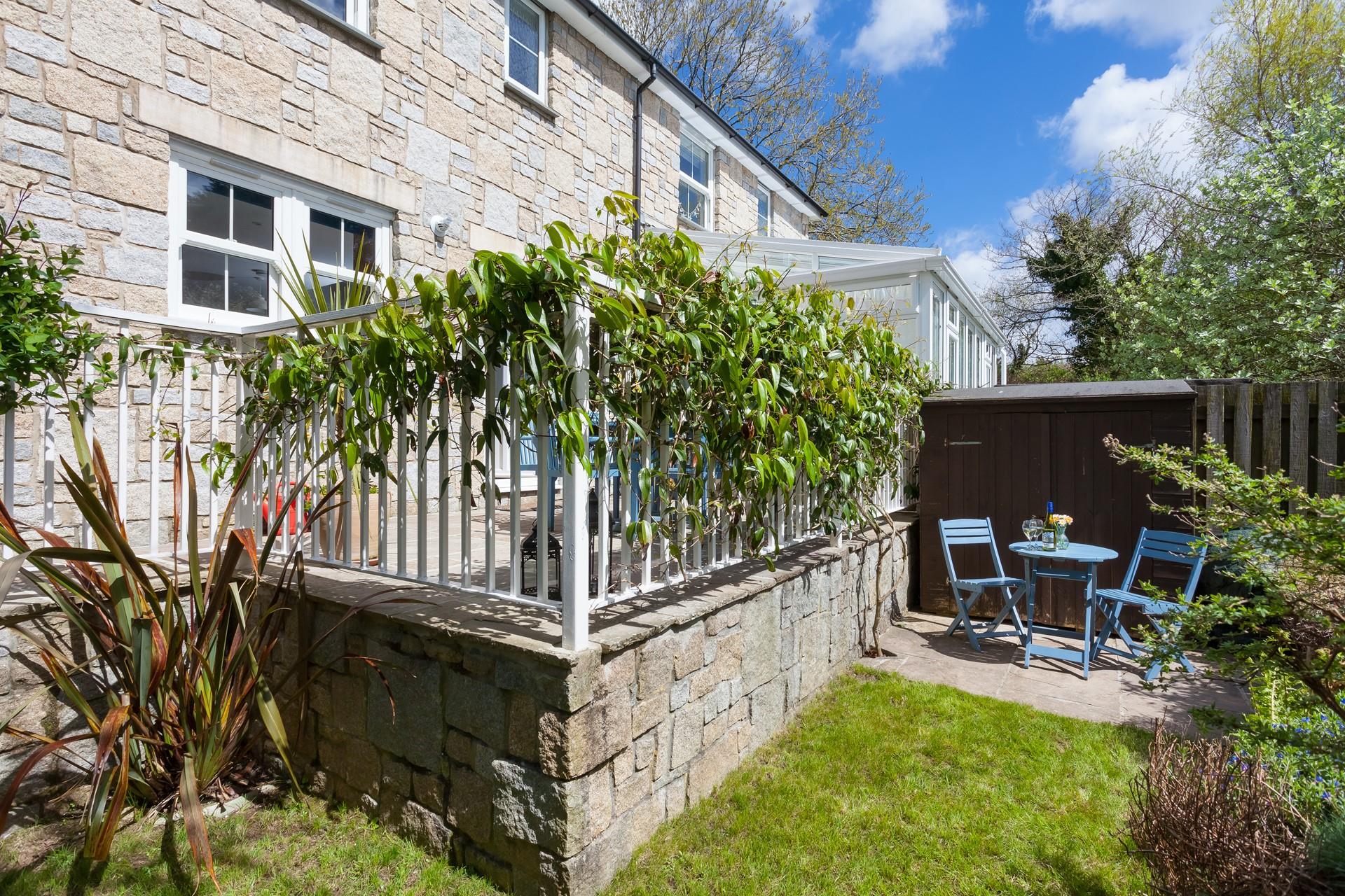 Enjoy a cold crisp glass of wine in the suntrap garden.