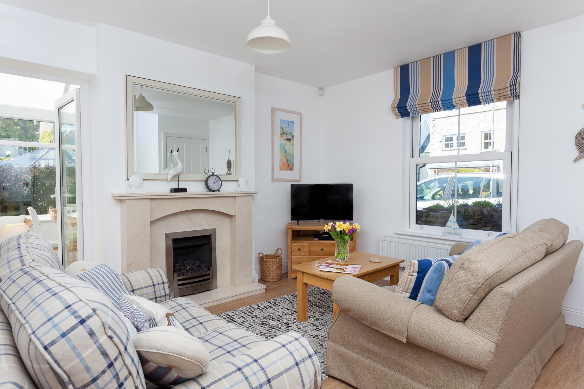 Snuggle up together on the sofa in front of the TV.