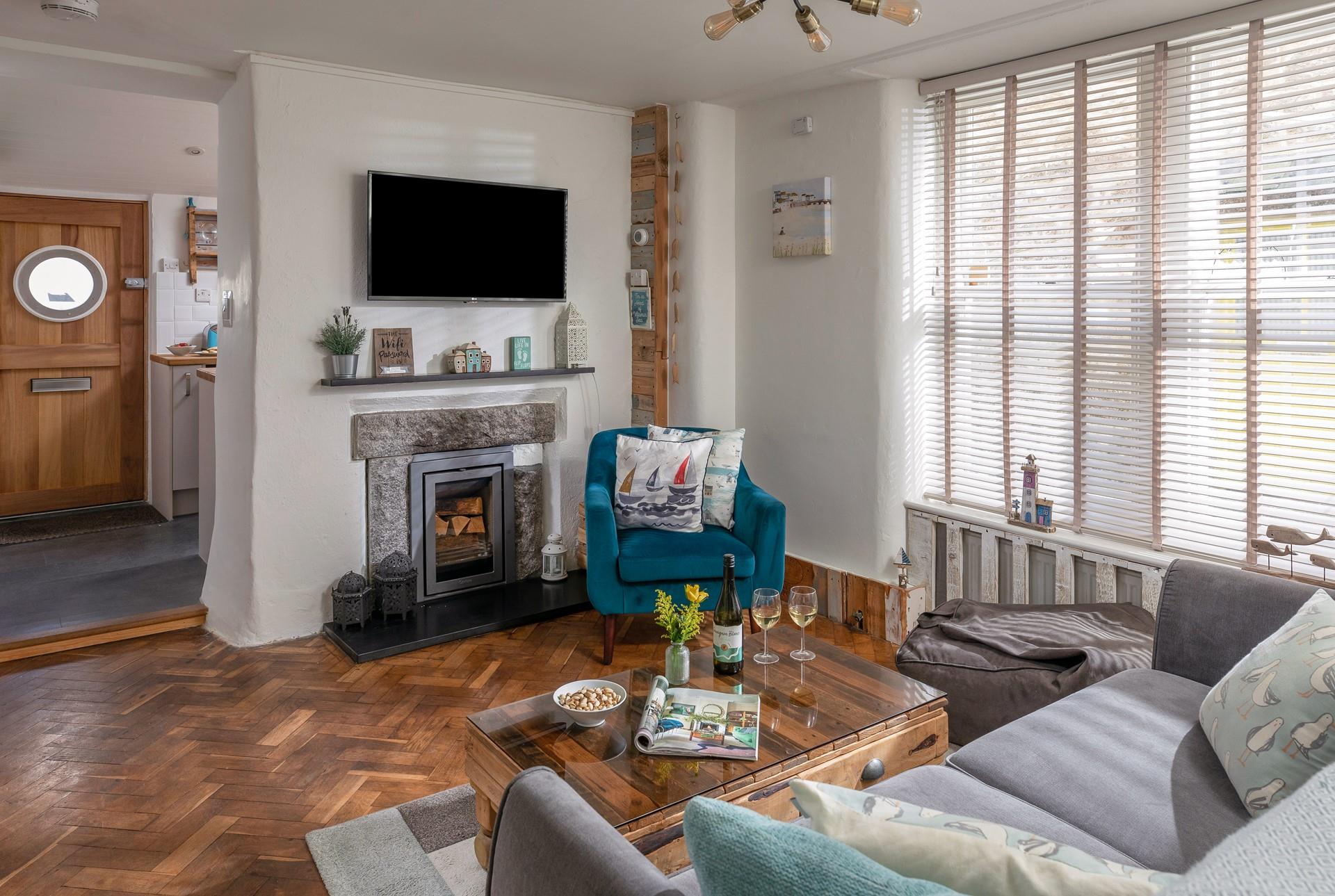 Snuggle up in front of the TV and relax knowing the waves of the Harbour are only a few steps away.