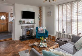 Snuggle up in front of the TV and relax knowing the waves of the Harbour are only a few steps away.