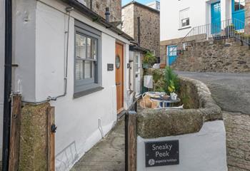 The outside area is a charming little sun trap, perfect for a morning coffee or an evening glass of wine.