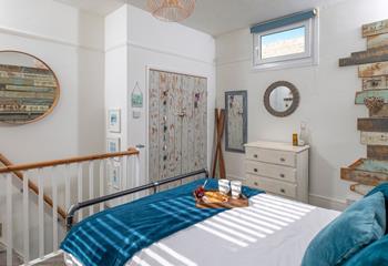 This wonderfully unique bedroom reminds you just how close to the sea you are.