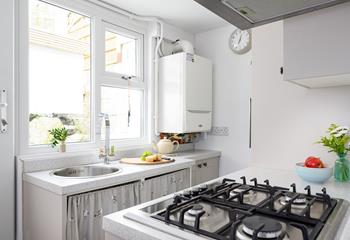 Though compact, the kitchen has been carefully designed to maximise space.