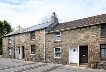 The cottage is set back from the hustle and bustle of the town, just a ten-minute walk to the centre of St Ives.