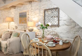 Enjoy afternoon tea in this chic cottage.