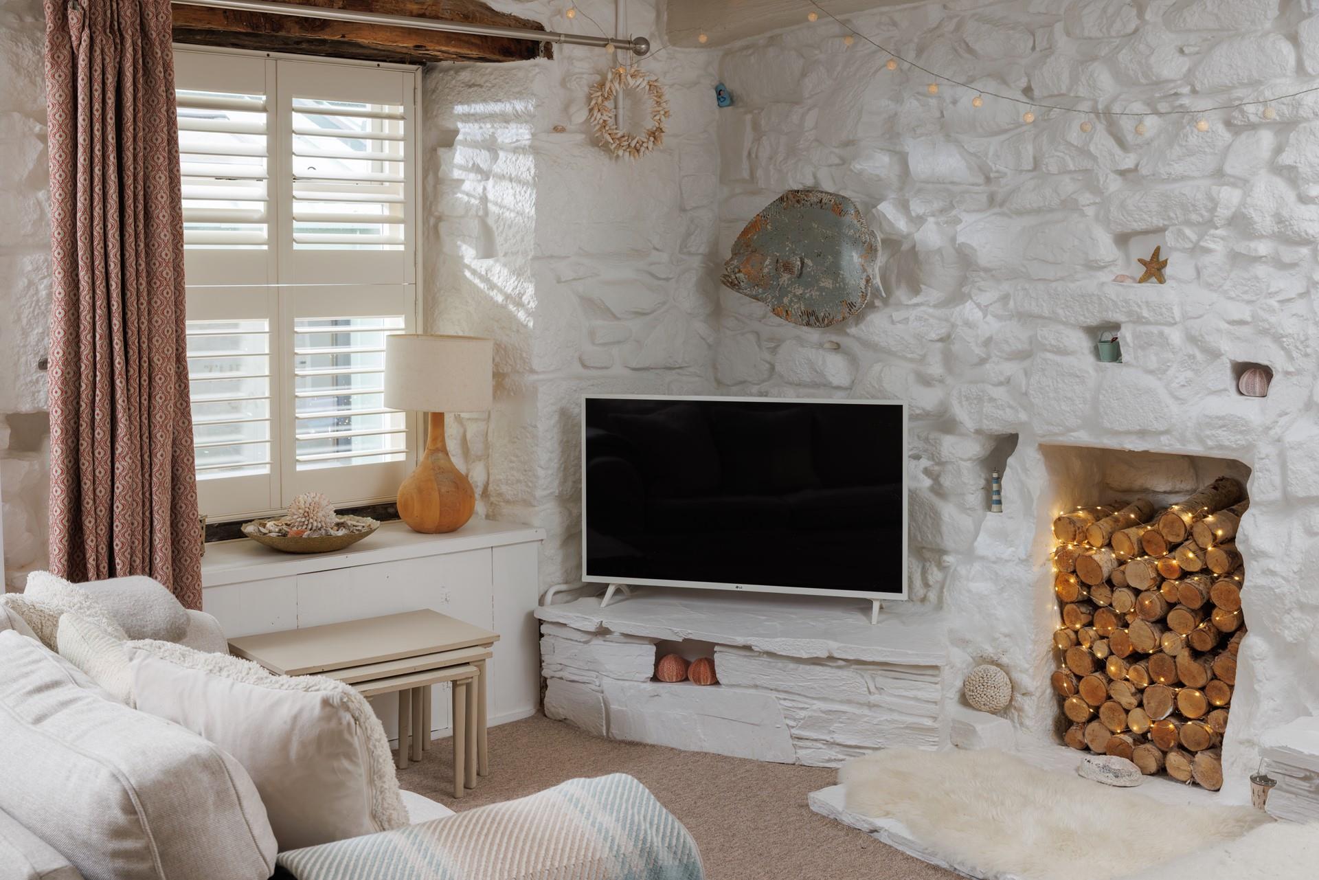 Cosy interiors are blended with classic cottage features.