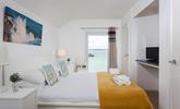 The king size room at the front of the apartment offers you harbour views. - Thumbnail Image