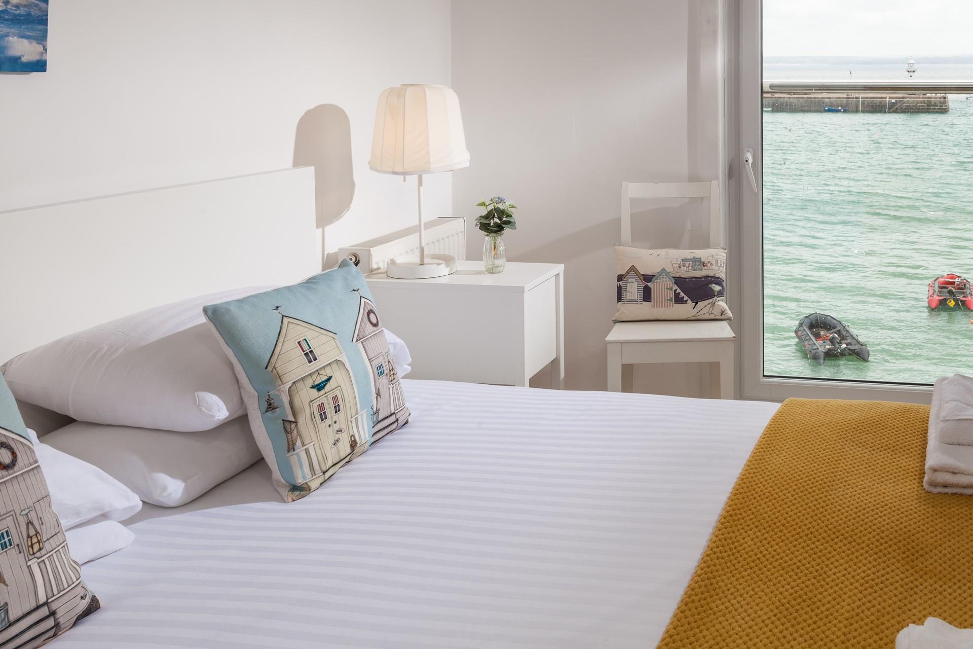 Lie in bed watching the sun come down before drifting off to sleep.