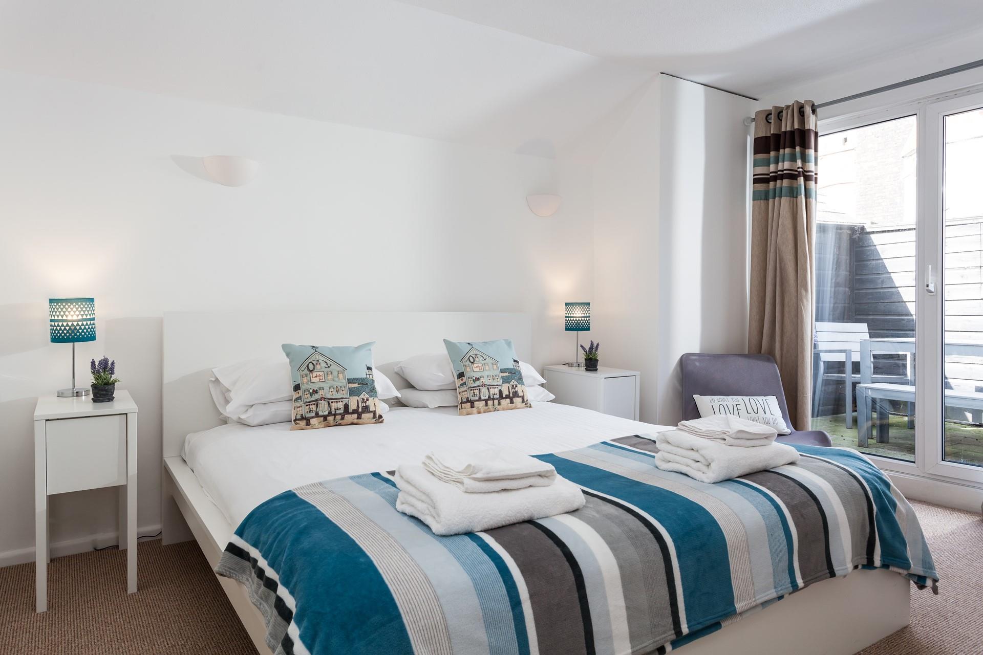 The double bedroom overlooks the rear terrace.