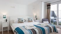 The double bedroom overlooks the rear terrace.