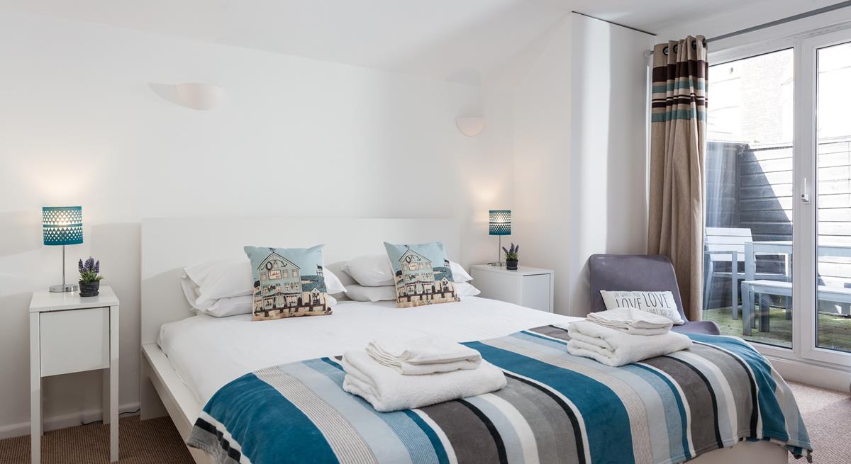 The double bedroom overlooks the rear terrace.