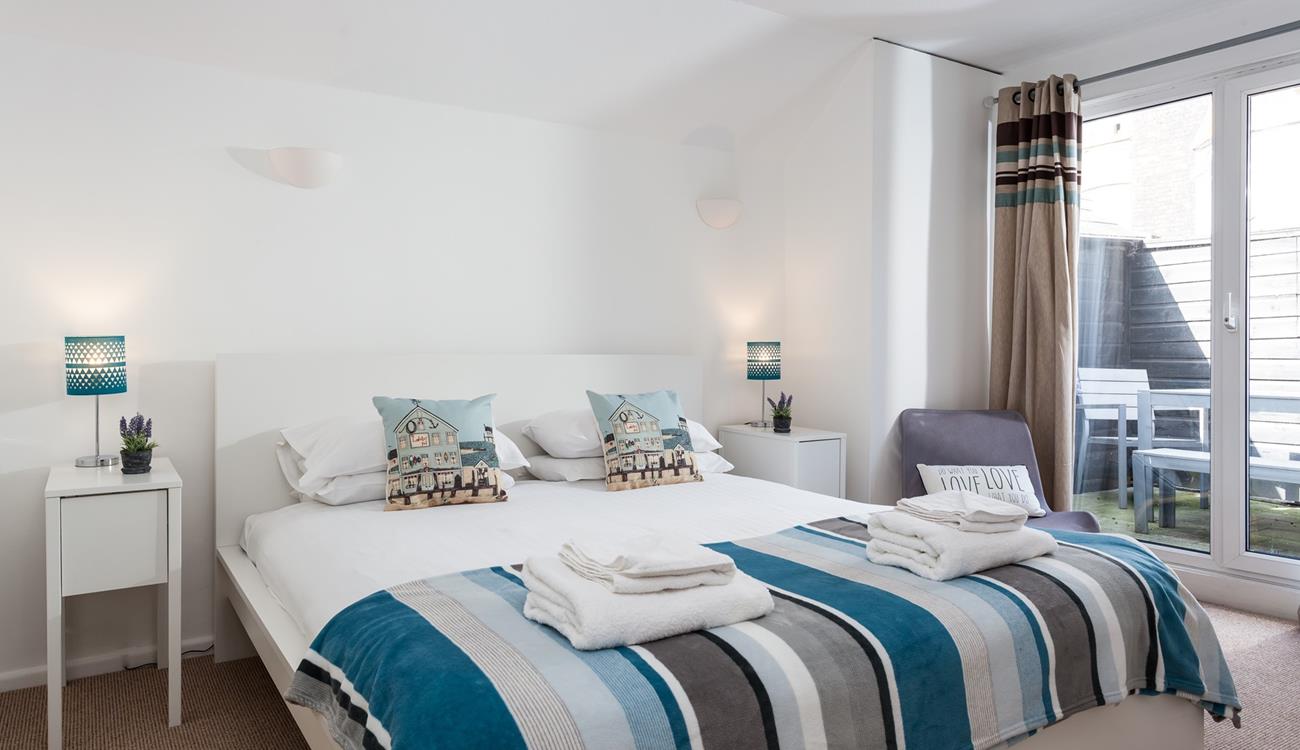 The double bedroom overlooks the rear terrace.