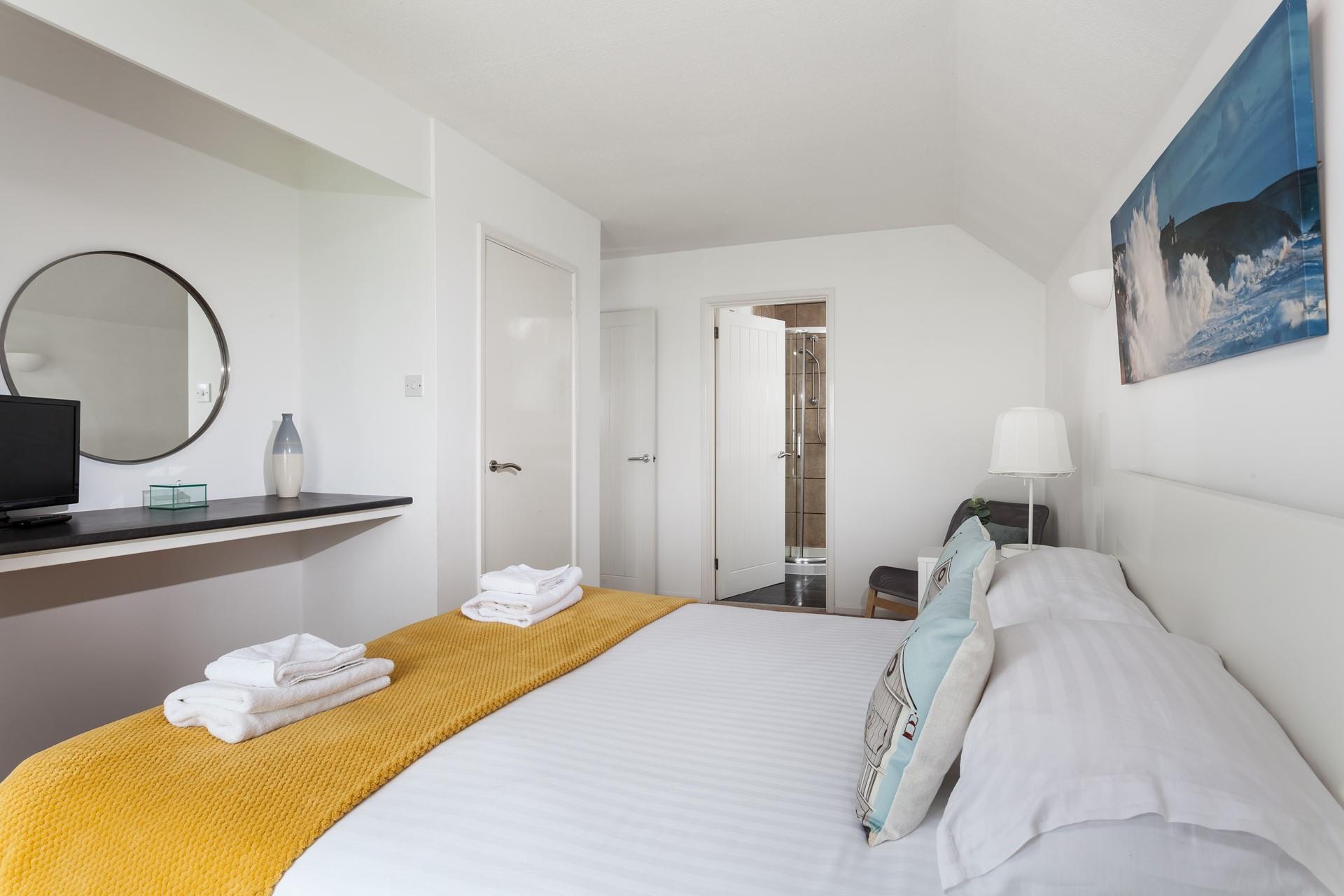 Wake up and start your day right with a hot shower in the en suite.