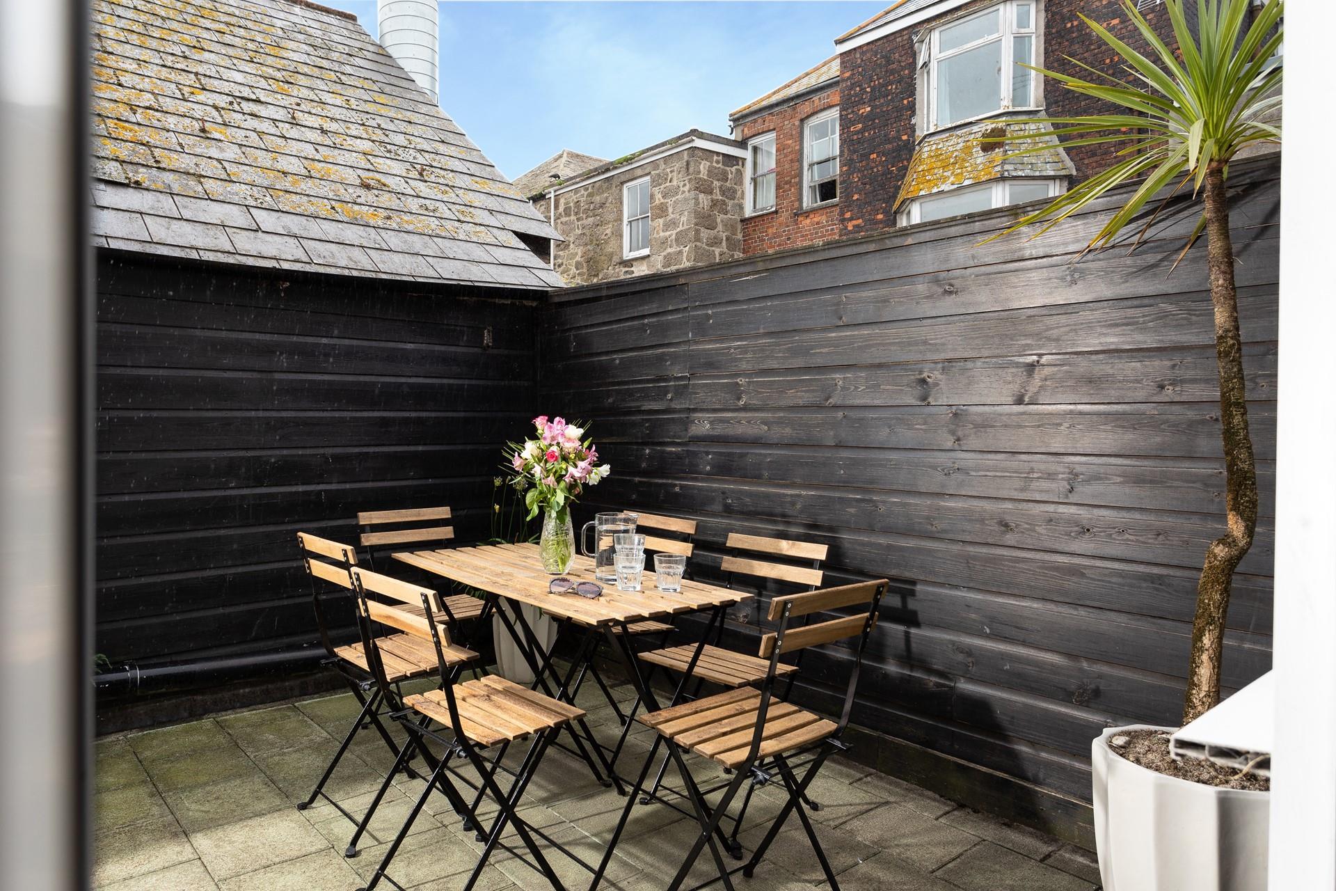 Step out to the patio and sip a cold drink in the sun.