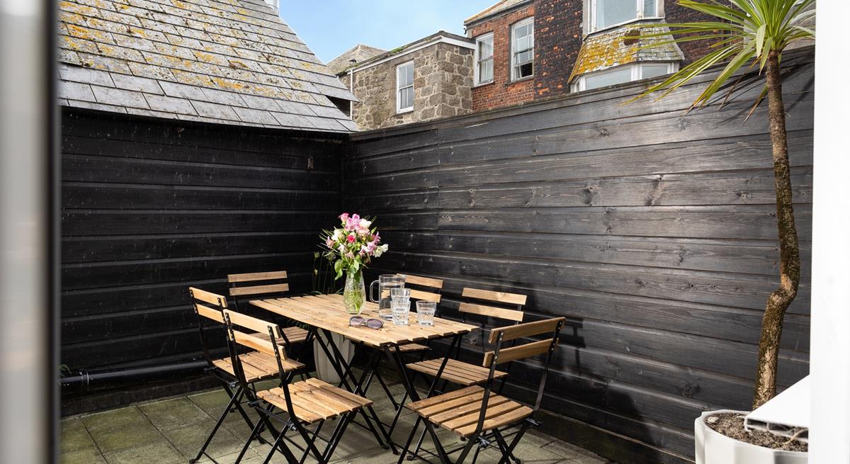 Step out to the patio and sip a cold drink in the sun.