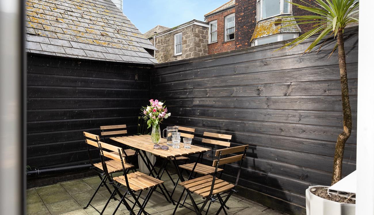 Step out to the patio and sip a cold drink in the sun.