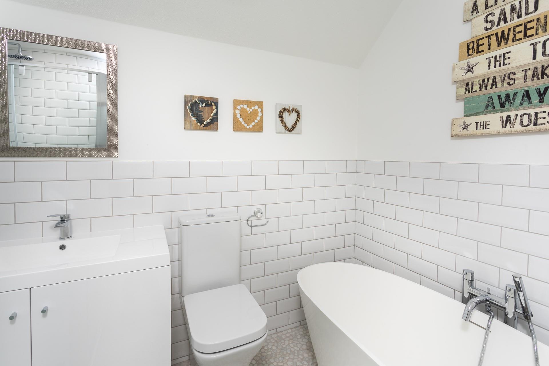 The modern bathroom is perfect for getting ready in the evenings to go out and explore the town.