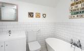 The modern bathroom is perfect for getting ready in the evenings to go out and explore the town. - Thumbnail Image