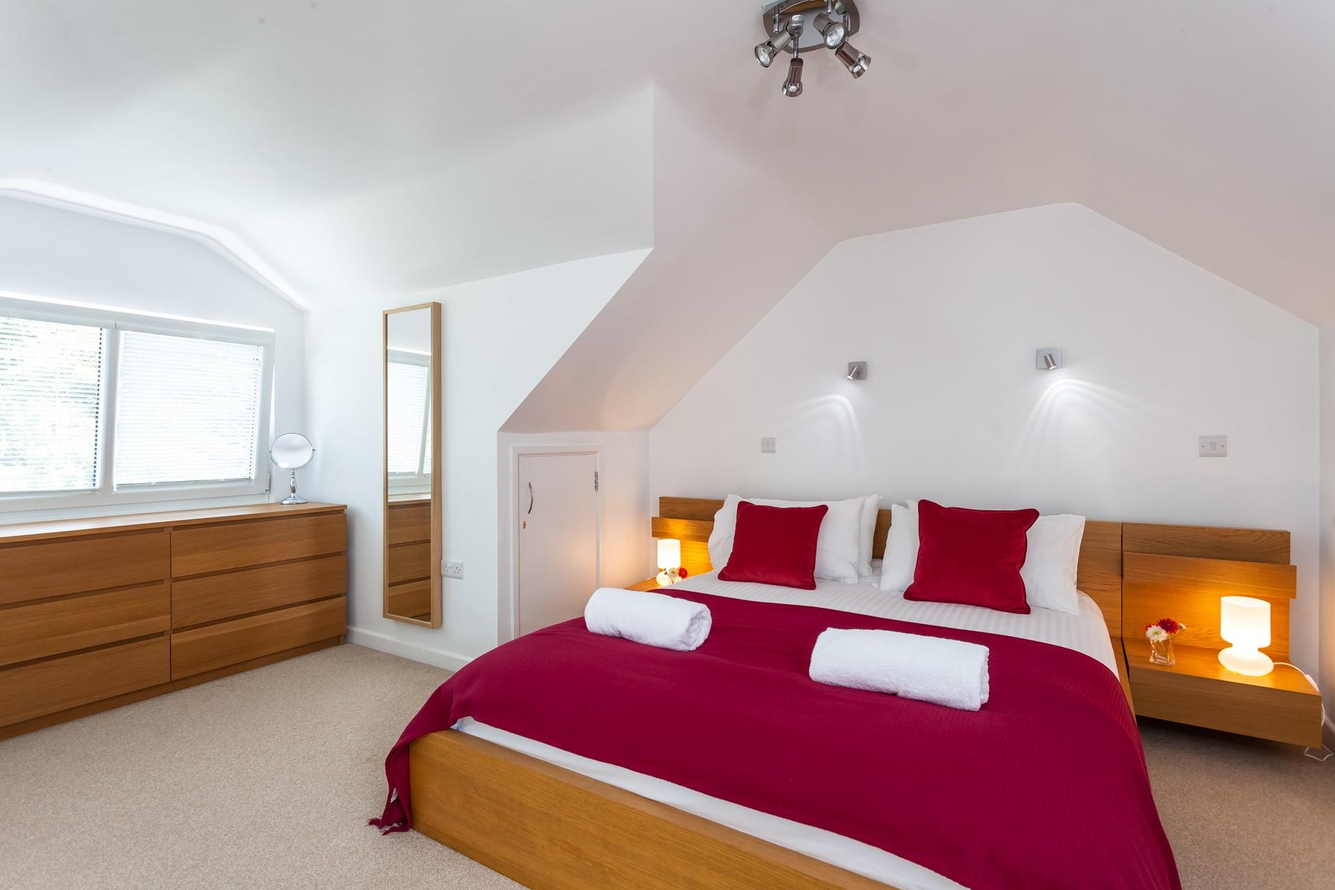 Bedroom 5 offers you a spacious haven of relaxation.