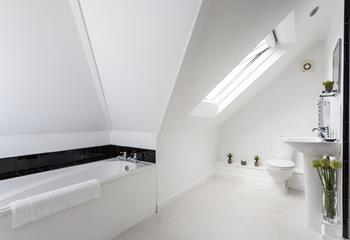 Bedroom 5 has a large en suite with a bath to soak in on chilly evenings.