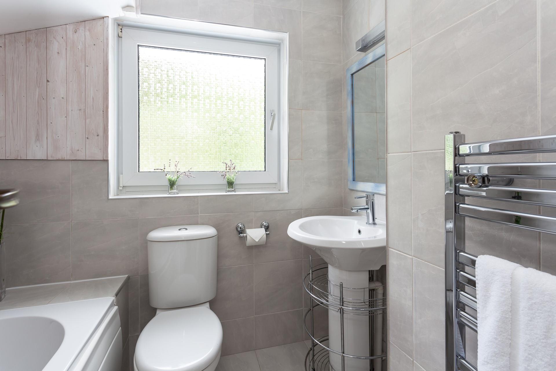 The family bathroom offers space to get ready in the mornings.