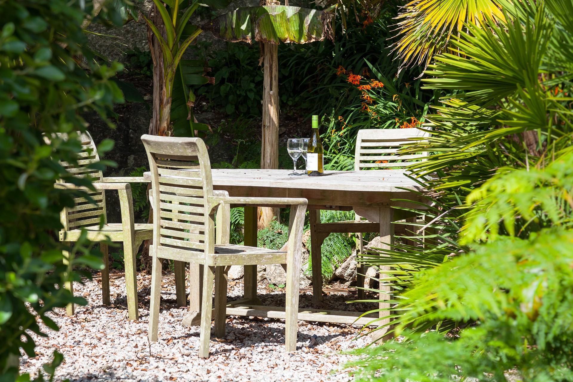 Sip wine in your garden soaking up the sun.