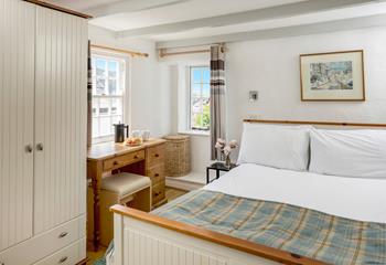 The double bedroom on the first floor has a sumptuous double bed along with a little en suite. 