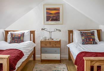 The top bedroom has the best views of the house, with views of the harbour and the famous house on the hill. 