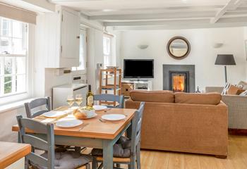 The open plan living area is quintessentially Cornish, with sash windows to let in the cooling breeze.