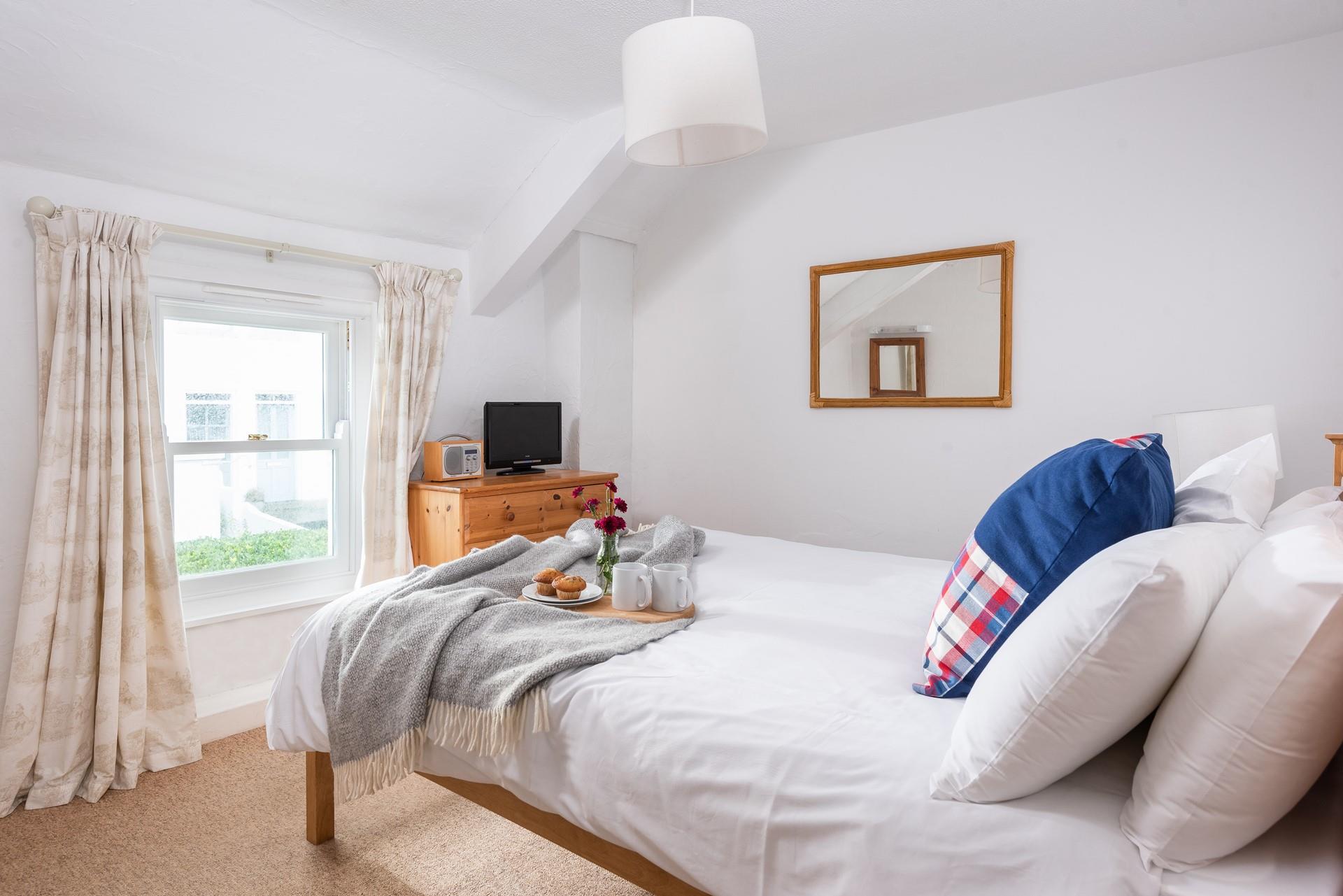 The comfortable double bed is sure to provide a perfect night's sleep.