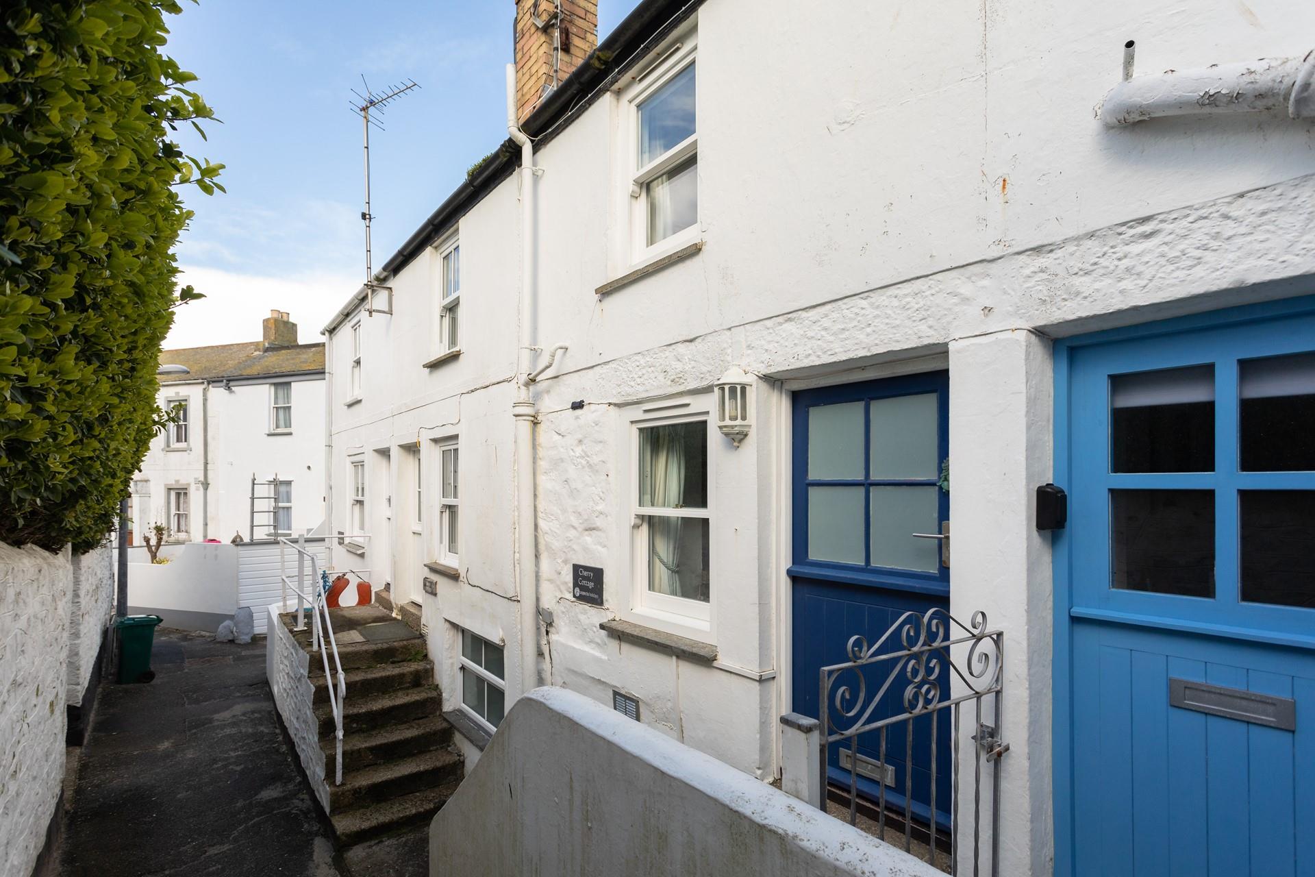 The bright door and clear signage make the property easy to spot! 
