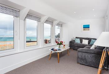 After a busy day exploring St Ives relax on the soft corner sofa with a glass of your favourite tipple and admire the view.