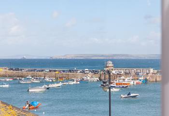 Watch the boats bobbing in iconic St Ives Harbour.
