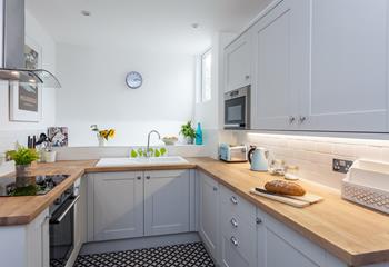 The kitchen is modern and stylish, perfect for rustling up tasty meals.