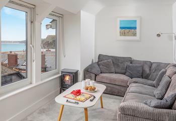 Pour yourself a glass of wine to sip in the cosy sitting room after a day in St Ives.