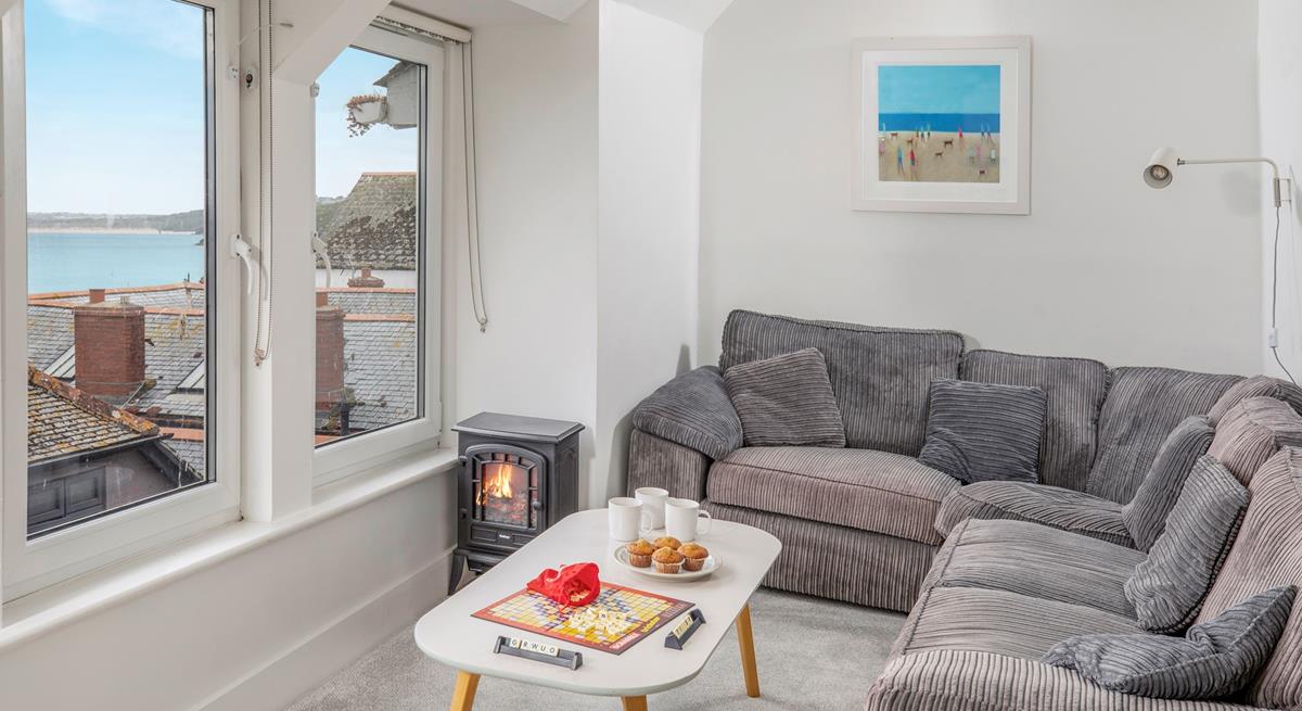 Pour yourself a glass of wine to sip in the cosy sitting room after a day in St Ives.