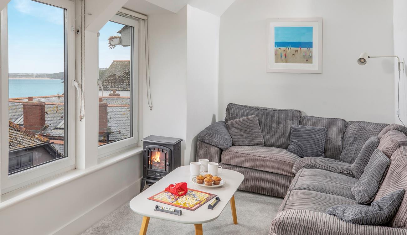 Pour yourself a glass of wine to sip in the cosy sitting room after a day in St Ives.