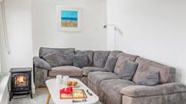 The large corner sofa is perfect for snuggling up in the evening with your loved ones.