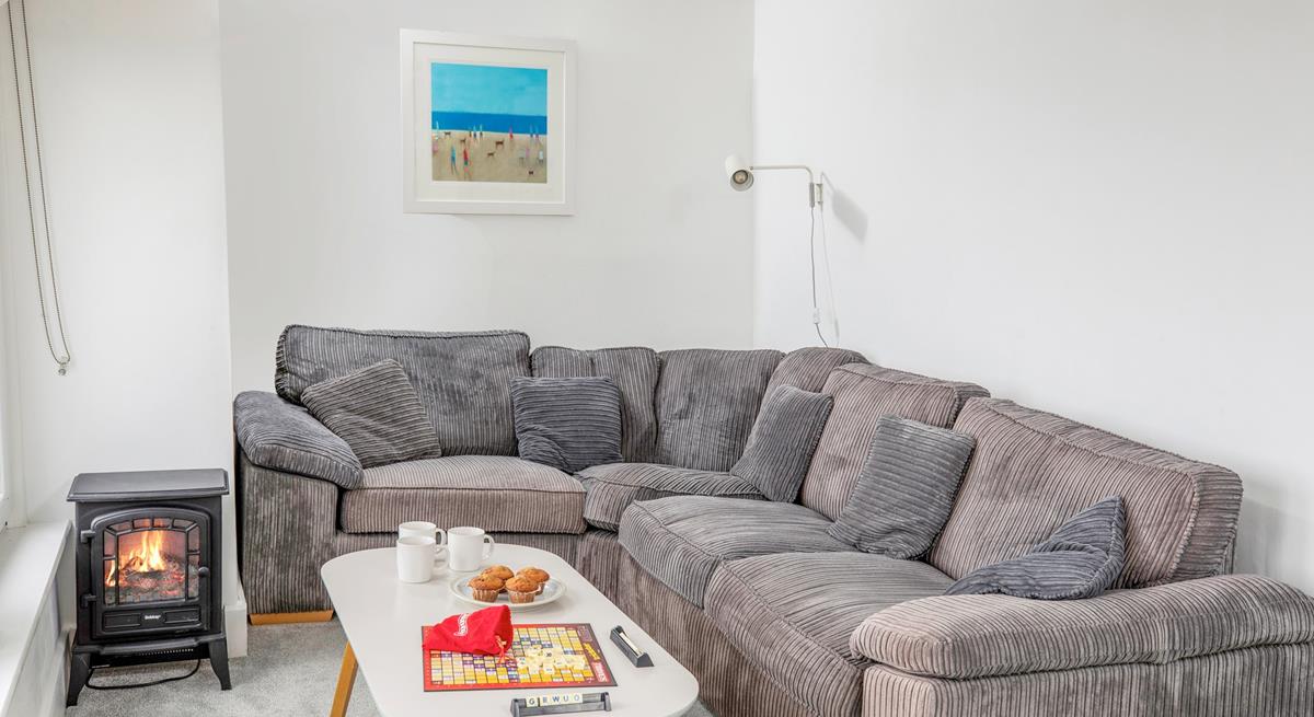 The large corner sofa is perfect for snuggling up in the evening with your loved ones.