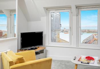 Take in the ever-changing sea view vista from the comfortable sitting room.