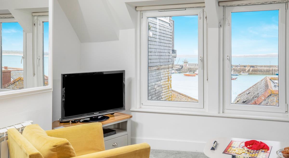 Take in the ever-changing sea view vista from the comfortable sitting room.