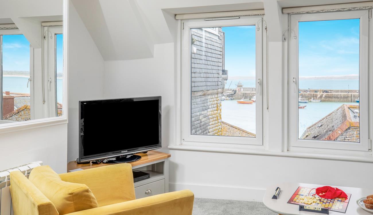 Take in the ever-changing sea view vista from the comfortable sitting room.