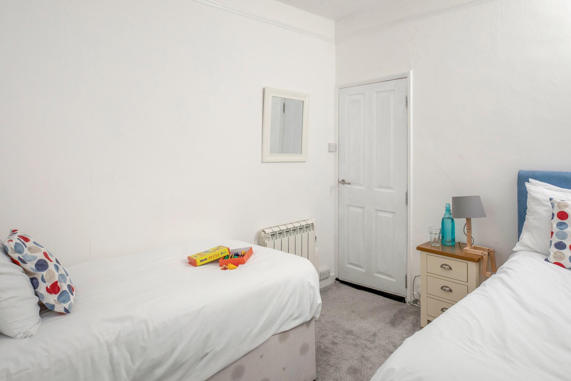 Twin beds allow for flexible sleeping arrangements for families or groups of friends.